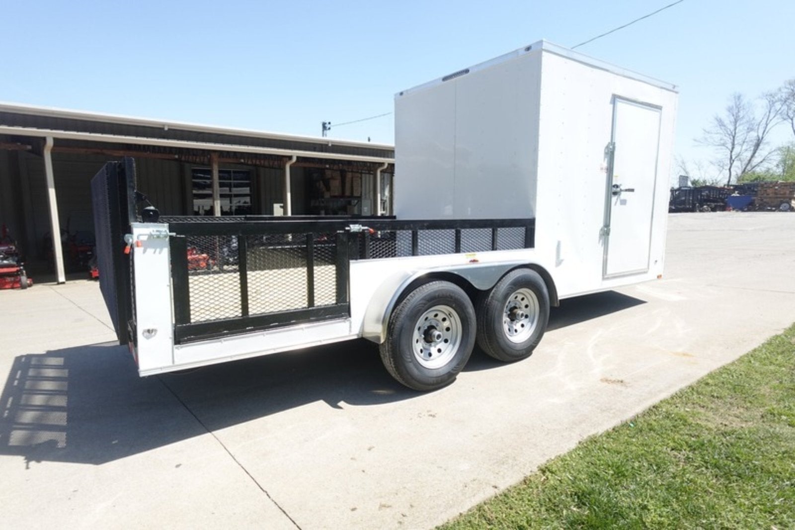 DSC03506.jpg 7×18 White Hybrid Enclosed V Nose (2) 7K Axles 2 Ft Fold Down Mesh Sides Pintle Hitch - Image 1